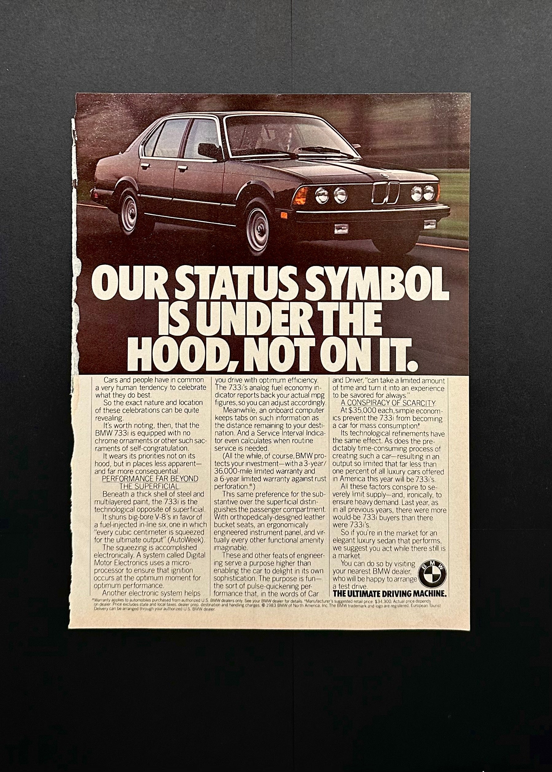 Vintage BMW Ad– “Our Status Symbol Is Under the Hood” (Early 1980s)